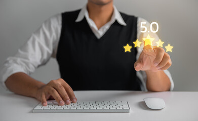 Fototapeta premium Businessman give 5 stars rating on virtual touch screen to service experience. Customer service and Satisfaction concept
