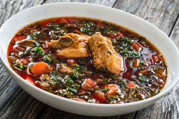 Borsch - beetroots soup on wooden table
