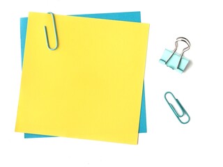 Empty yellow post it and paper clips on a white background 