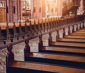 Rows of church benches at the old european catholic church.