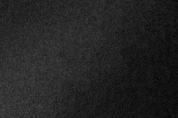 Black color velvet paper texture background.
