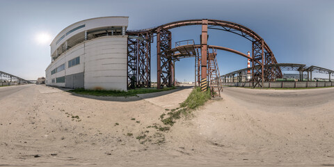 spherical 360 hdri panorama near industrial architecture and communications, pipes and metal...