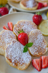 Close-up delicious pancakes, with fresh blueberries, raspberry 