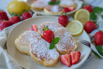Close-up delicious pancakes, with fresh blueberries, raspberry 