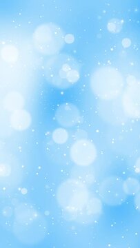 Blurry bright blue Christmas bokeh with flickering star shapes vertical loop background. Concept holiday animation.