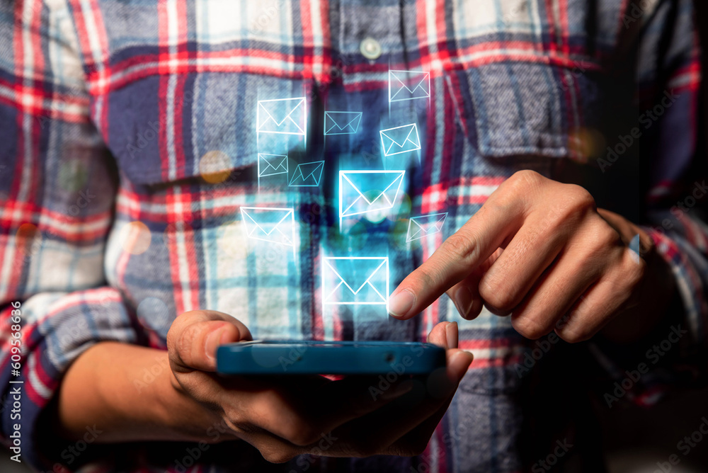 Aufkleber businessman using smart phone sending email on virtual screen, email marketing concept, sending mass