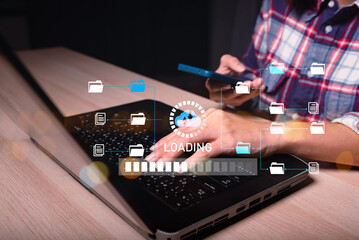 Big data analytics and business intelligence concept with chart and graph icons on a digital screen interface and a businessman in background