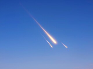 Fireballs in the clear blue sky. Meteorites in the daytime. Fall of meteors in the morning.