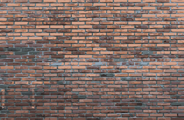 painted a large brick wall of old brick brown shades