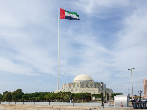 UAE Flag in Abu Dhabi (UAE) with Abu Dhabi Theater - Emirates Heritage Club