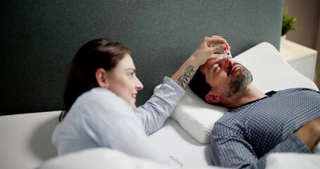 Woman Trying To Stop Snoring And Sleep Apnea