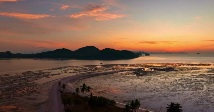Aerial view stunning sky at sunrise above coconut trees.
Wonderful aerial view of colorful landscape during the sunset.
 Flying over Laem Had sand beach. 
Aerial view of Laem Had Beach in Koh Yao Yai.