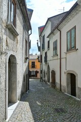 A narrow street in Nusco, a small mountain village in the province of Avellino, Italy.
