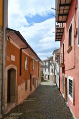 Fototapeta na wymiar A narrow street in Nusco, a small mountain village in the province of Avellino, Italy.