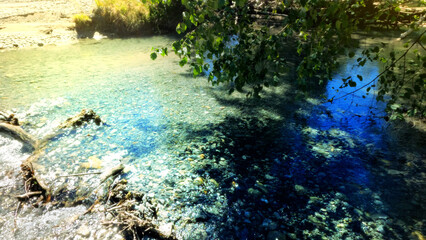 small clear cold river with boulder stones in Arkhyz mountain ridge - photo of nature