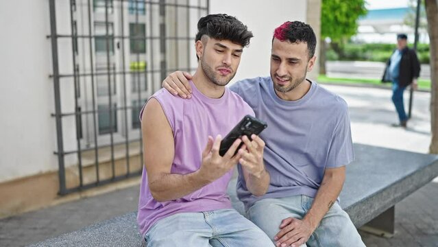 Two men couple smiling confident make selfie by smartphone at street