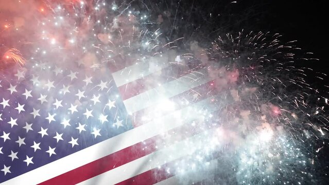 Real fireworks display with flag of USA 4K footage. 4th of July celebration background video.