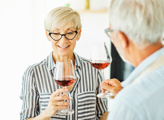 love kitchen senior glass woman couple home retirement happy food smiling husband wine together portrait