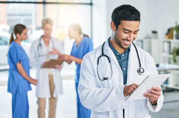 Smile, doctor and tablet with man in hospital for digital report, networking and medical research....
