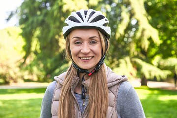 Promoting eco-health, a helmeted woman embodies active care in the park.