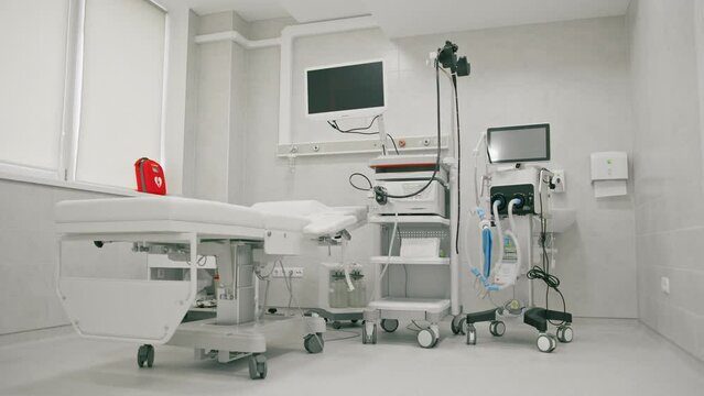 Medical equipment for gastroscopy in the office of the clinic a couch for patients and a gastroscopy with a monitor