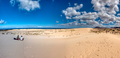 Panoramic view of the Dunas de Corralejo, (Corralejo Dunes), a stunning white sand beach on Fuerteventura Island, Canary Islands, Spain