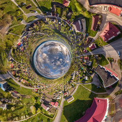 blue sphere inside overlooking old town, urban development, historic buildings and crossroads with cars. Transformation of spherical 360 panorama in abstract aerial view.