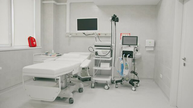Medical equipment for gastroscopy in the office of the clinic a couch for patients and a gastroscopy with a monitor