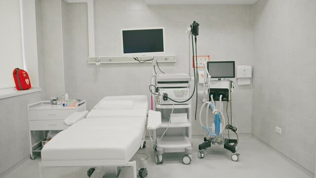 Medical equipment for gastroscopy in the office of the clinic a couch for patients and a gastroscopy with a monitor