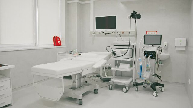 Medical equipment for gastroscopy in the office of the clinic a couch for patients and a gastroscopy with a monitor