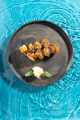 japanese cuisine sushi rolls on blue water background