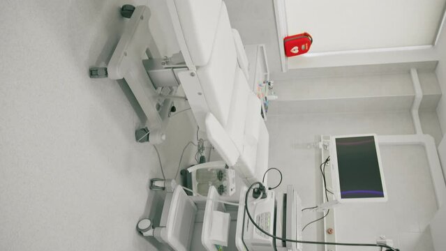 Medical equipment for gastroscopy in the office of the clinic a couch for patients and a gastroscopy with a monitor
