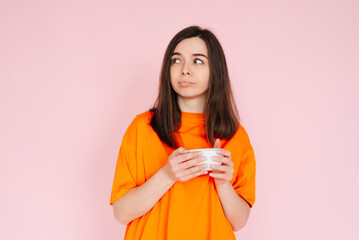 Sophisticated Taste: Elegant Woman Contemplating Drink Selection, Gazing at Empty Space - Decadence...