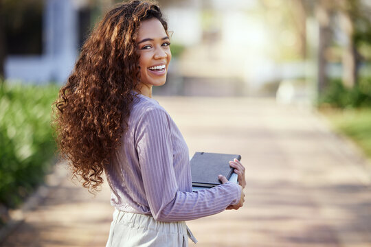 Woman with smile, books and student in campus garden, university and education with learning material for studying. Female person in outdoor portrait, academic scholarship and mockup space with study