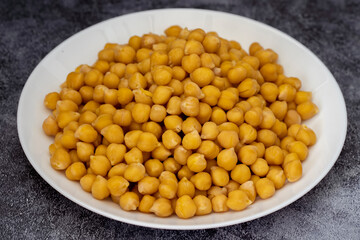 Freshly boiled chickpeas in a plate.