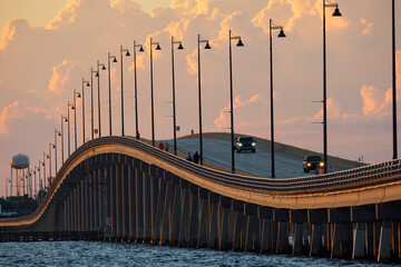 Barron Collier Bridge and Gilchrist Bridge in Florida with moving traffic. Transportation...