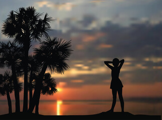 girl and palm trees near sea at dark sunset