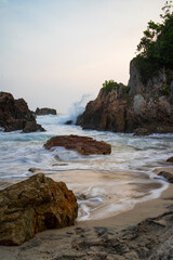 photo of a beach and waves motion at the beach daylight good for background