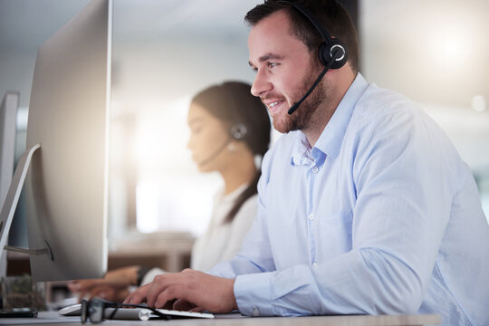 Call center, consulting and computer with business man in office for communication, customer service or help desk. Telemarketing, sales and advice with employee for commitment, contact us and hotline