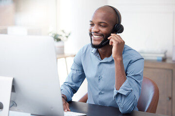 Black man, callcenter with phone call and contact us, communication with headset and CRM in office. Male consultant at computer, customer service or telemarketing, tech support and help desk worker
