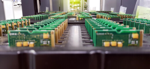 Electronics Manufacturing Services, Assembly Of Circuit Board arrangement, close-up of the raw of PCBA in tray.