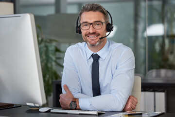 Obraz premium Businessman, call center and portrait smile in customer service, support or telemarketing at office. Happy man, consultant or agent smiling with headphones for online advice or telesales at workplace