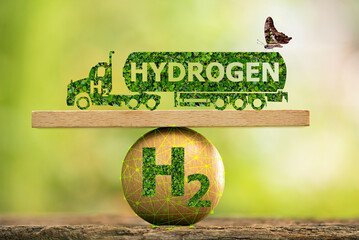 H2 and hydrogen text and fuel cell truck green leaves on nature background.