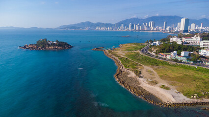 cityscape nha trang city in vietnam shot from drone, gorgeous asia, beach by the sea, modern city in tropics, island with buddhist temple