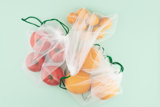 shopping bag with vegetables and fruits,Reusable mesh bag for eco-conscious shoppers,responsible shopping