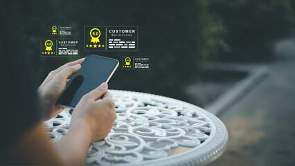 Blurred woman holding smatphone and give rating to service experience on online application background with Customer review satisfaction feedback survey concept, quality, service, business ranking.