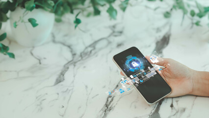 Business woman holding smart phone with network security icon. Protection network security computer and safe your data concept, cybersecurity and protection against dangers. Quality Assurance