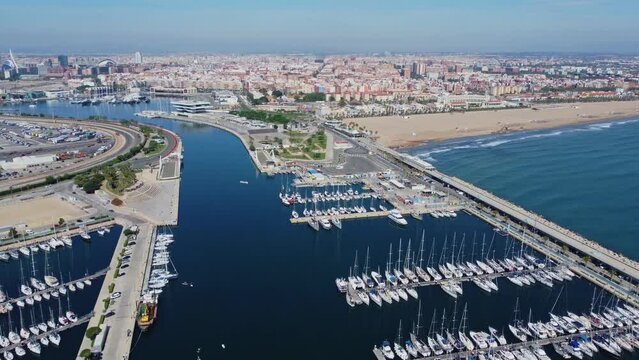 4K Drone Footage. Valencia. Aerial View yacht harbor port, beach, building. Spain. 28 may 2023