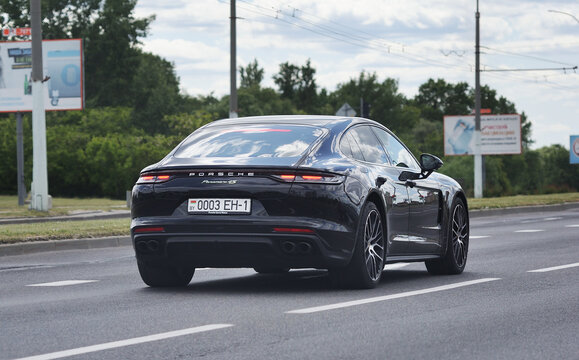 Porsche Panamera 4s moves on the road.