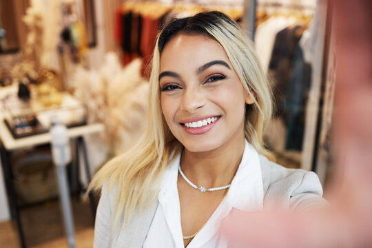 Woman, portrait and selfie with smartphone with shop in closeup for happiness. Female person, face and selfies at a store with a smile for a sale with beauty to share online with digital app.